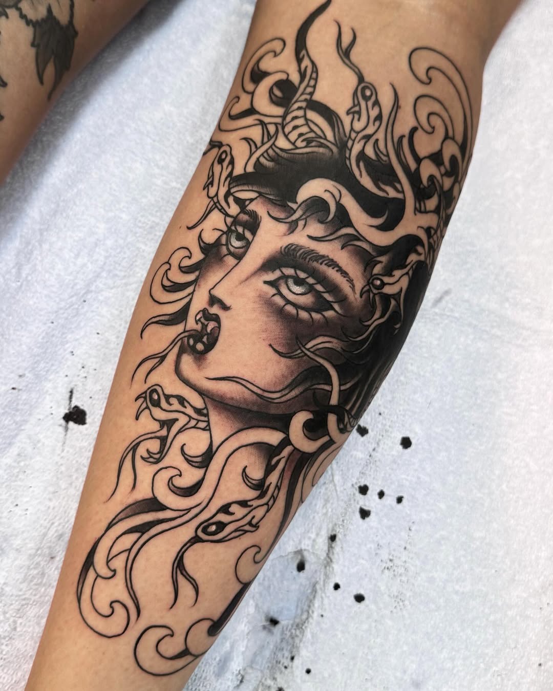 Medusa Lower Leg Tattoo in Psychotrad Style