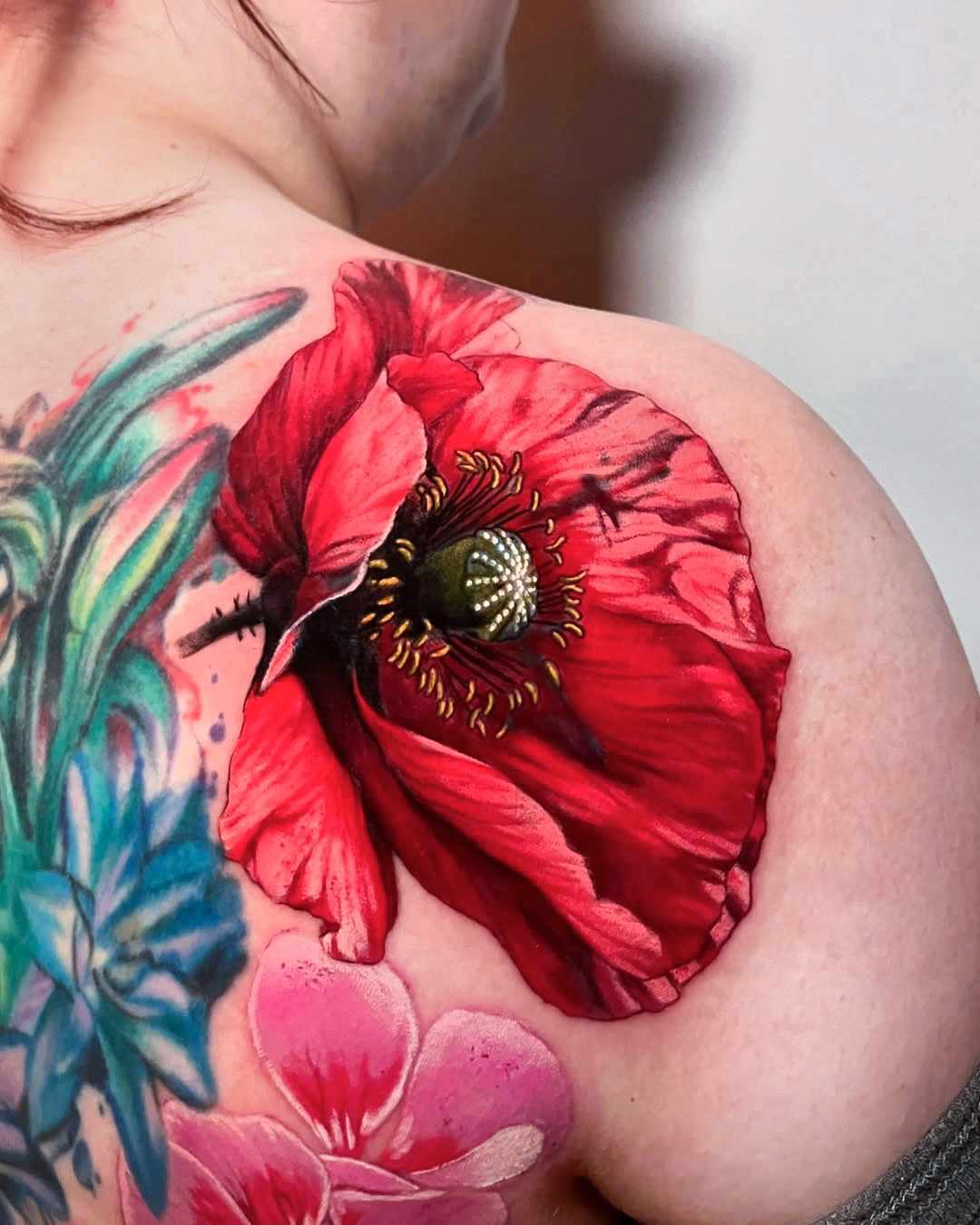 Shoulder Poppy Tattoo as Part of a Floral Back Piece