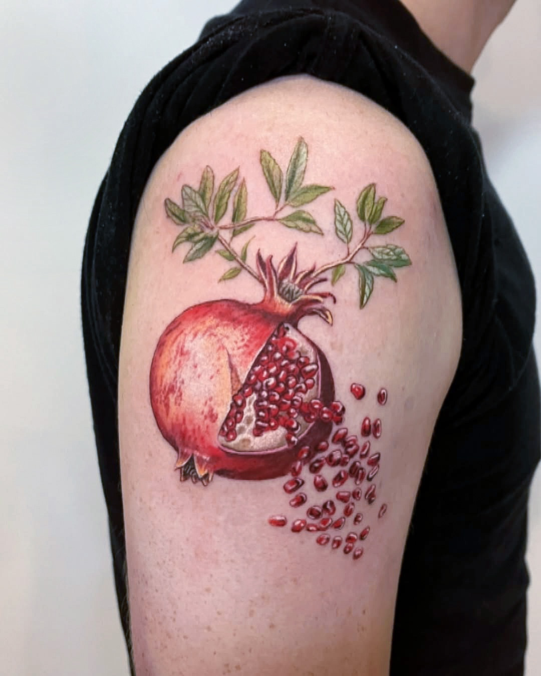 Realistic Pomegranate Tattoo on Shoulder