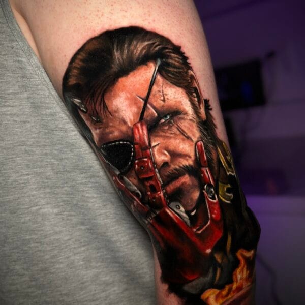 Solid Snake Portrait Tattoo on Upper Arm