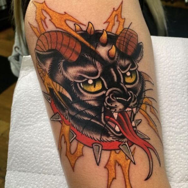 Bold Traditional Hell Cat Tattoo on Arm