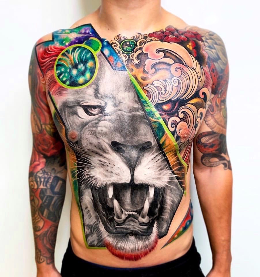 Full Torso Tattoo of a Lion in Realism and Abstract Styles