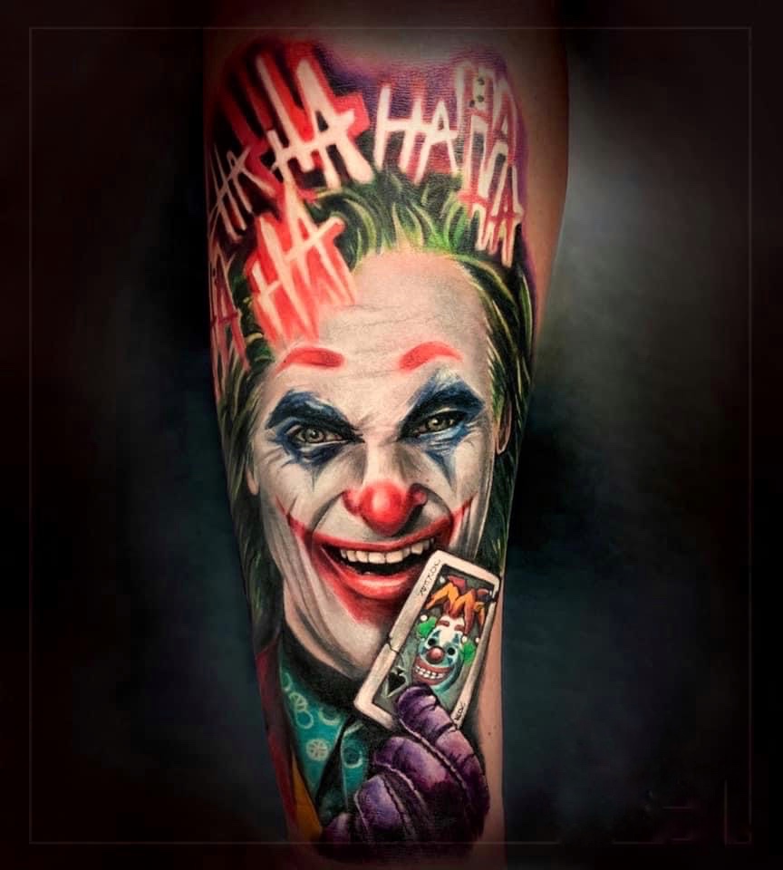 Color Realism Tattoo of Joaquin Phoenix as Joker on Forearm