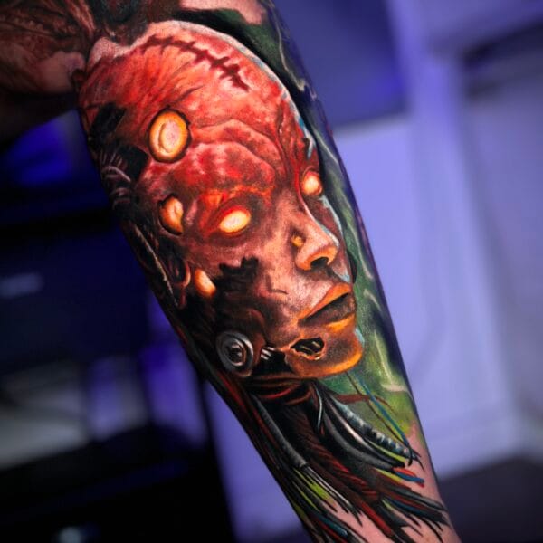 Lower Leg Biomech Tattoo of a Futuristic Character