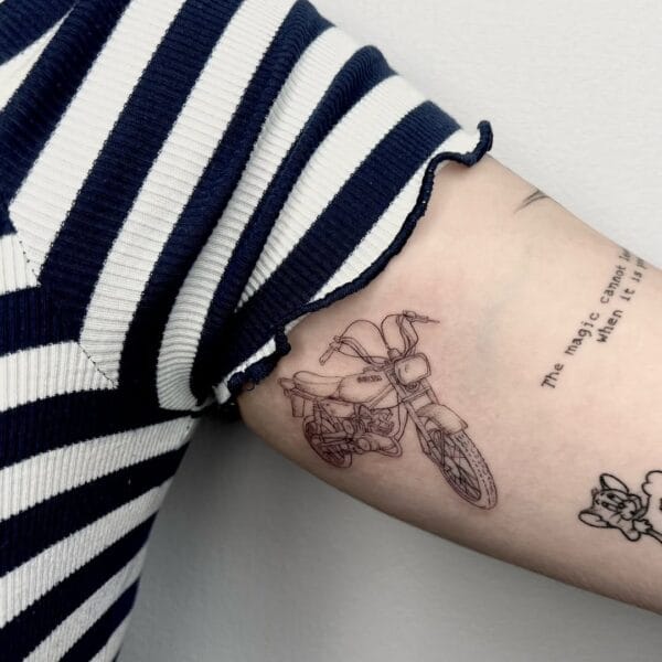 Minimalistic Motorcycle Tattoo on Biceps