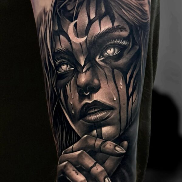 Moon Symbol Witch Tattoo in Black and Gray on Arm