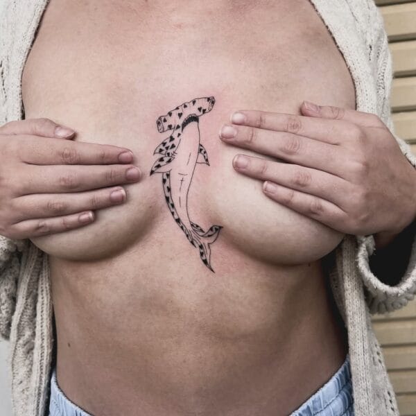 Outline Shark Tattoo with Heart Pattern on Sternum