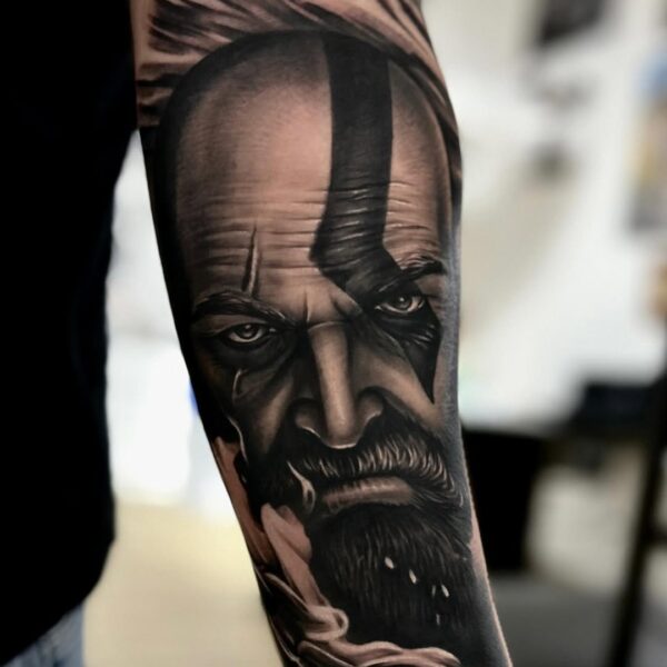 Kratos Portrait Tattoo on Forearm