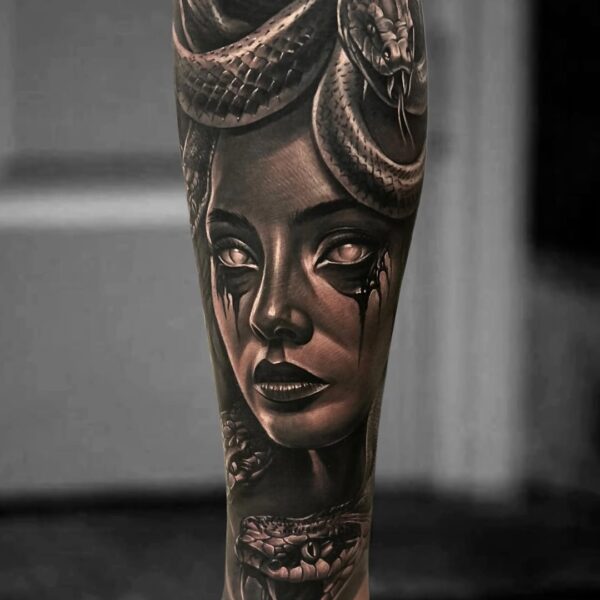 Black and Gray Realism Tattoo of Medusa on Lower Leg