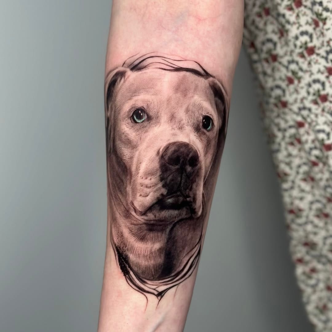 Realistic Dog Portrait with Colored Eyes on Forearm