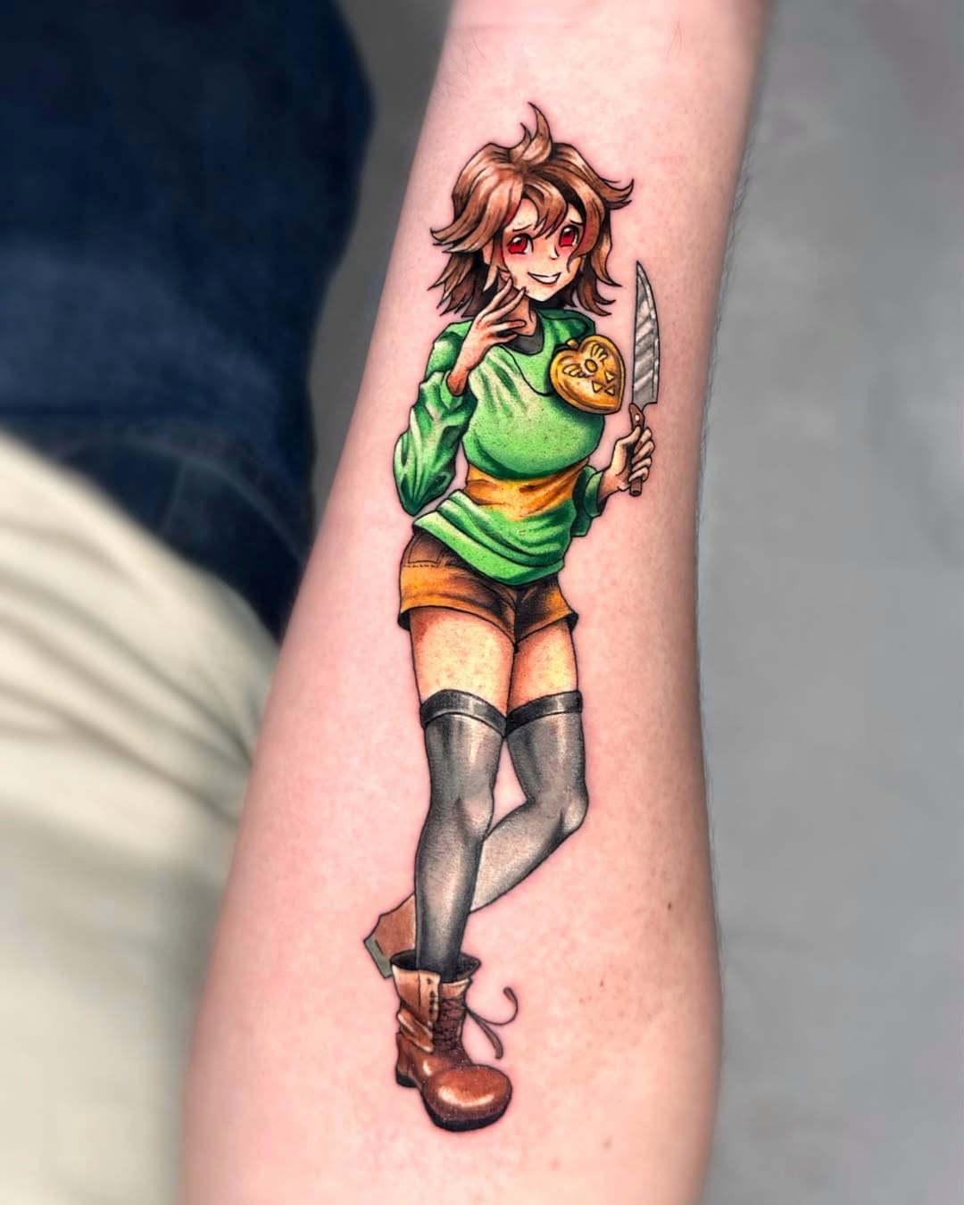Colorful Chara Tattoo from Undertale on Forearm