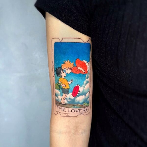 Ponyo and Sosuke Tattoo in Tarot Card Style on Upper Arm