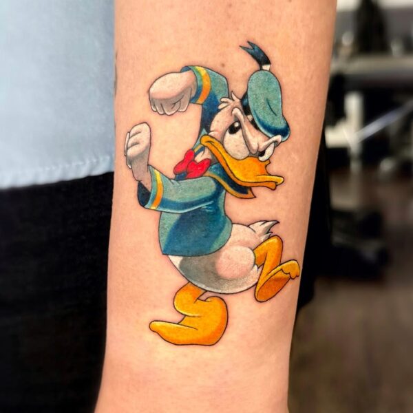 Vibrant Donald Duck Tattoo on Forearm