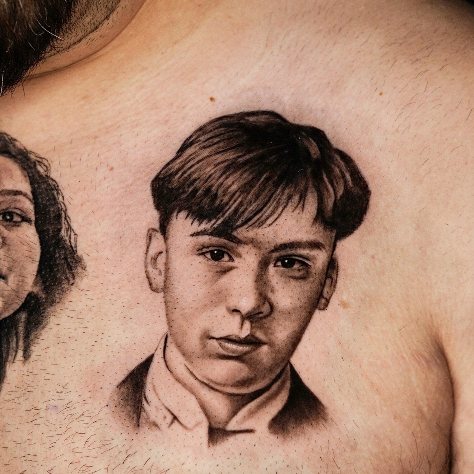 Black and Gray Portrait Tattoo on Chest
