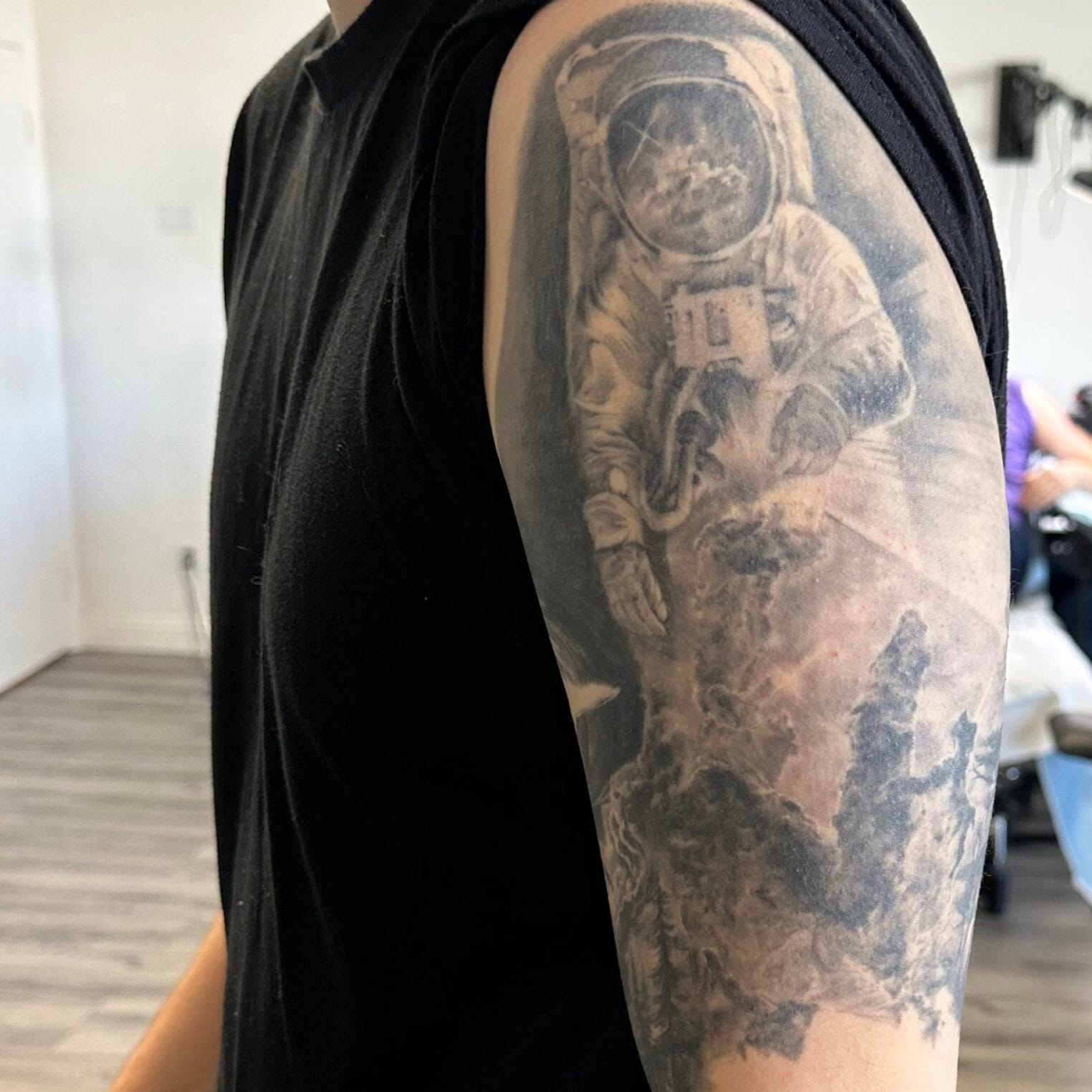 Spaceman Tattoo on Shoulder Cover Up Work