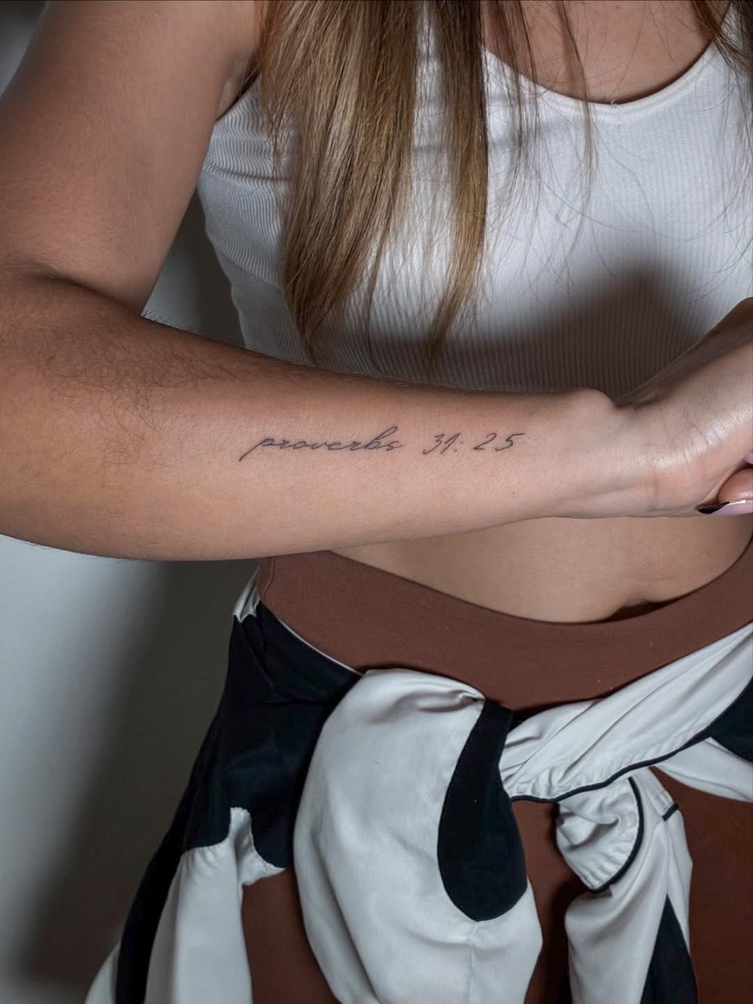 Gentle Script Tattoo On Side Of Forearm