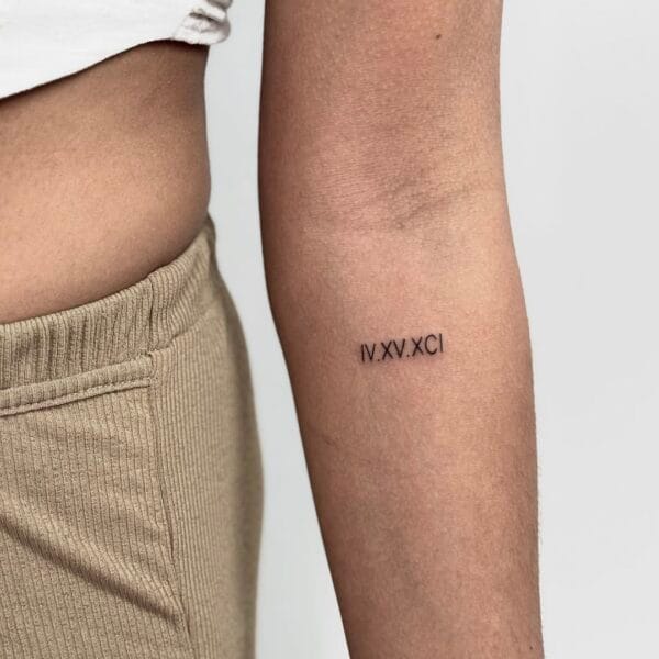 Tiny Roman Numeral Tattoo on Forearm