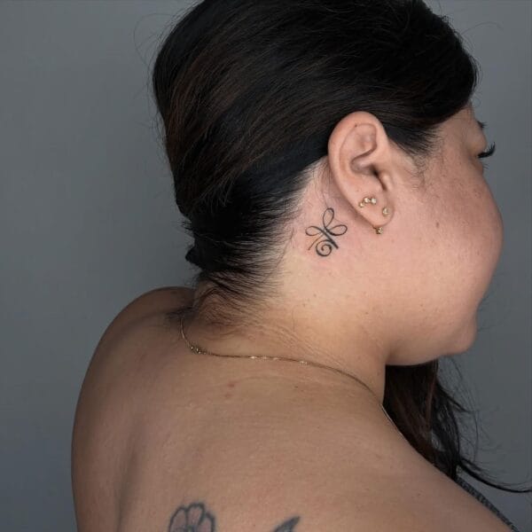 Small Tattoo Behind the Ear