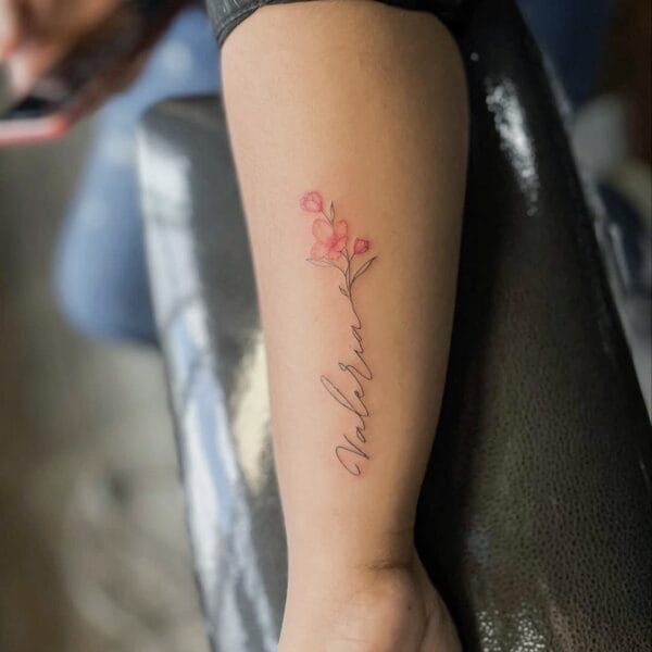 Minimalistic Script and Flower Forearm Tattoo