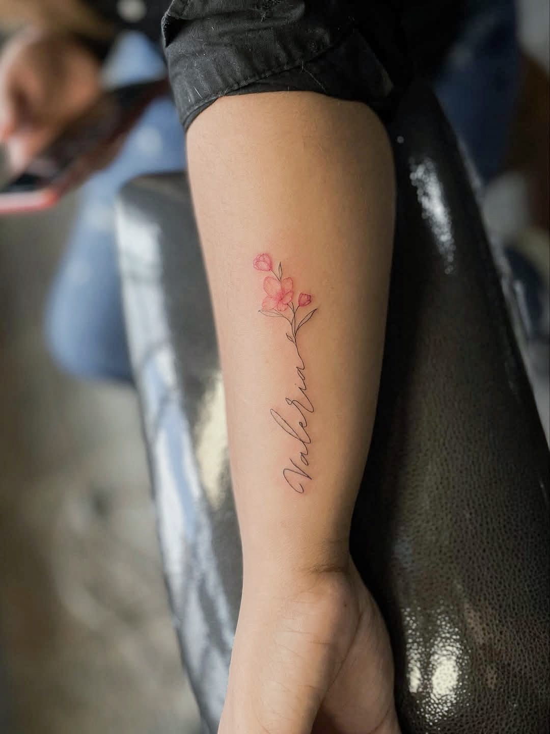 Minimalistic Script and Flower Forearm Tattoo