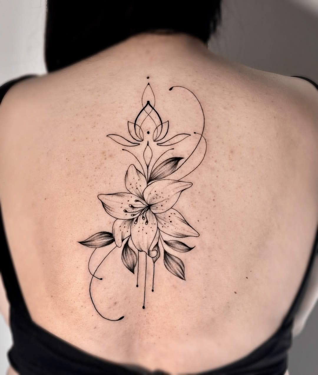 Gentle Lily Tattoo with Ornaments on Back