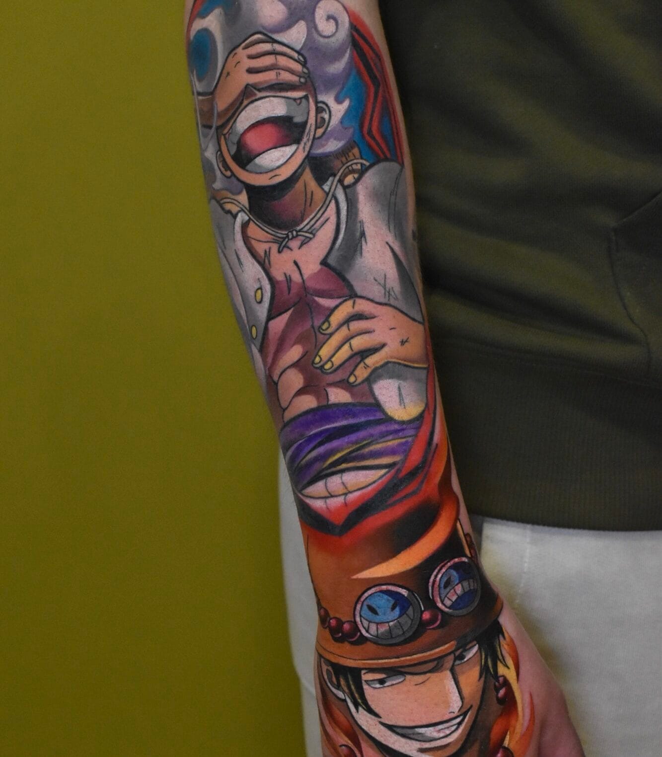 One Piece Anime Tattoo on Forearm and Hand