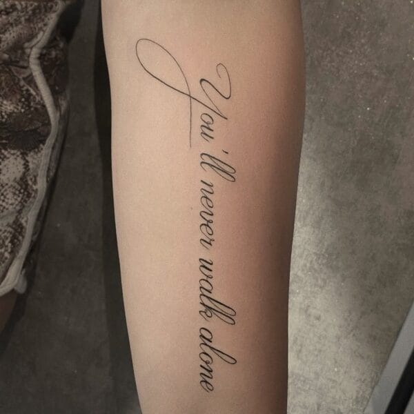 Elegant Script Forearm Tattoo