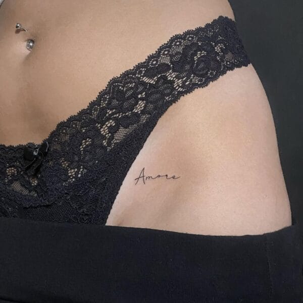 Delicate Script Tattoo On Hip