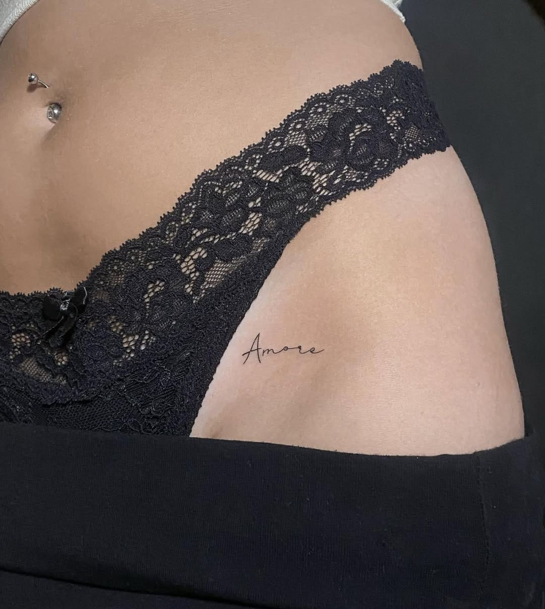 Delicate Script Tattoo On Hip