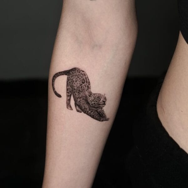 Small Black And Gray Leopard Tattoo On Forearm