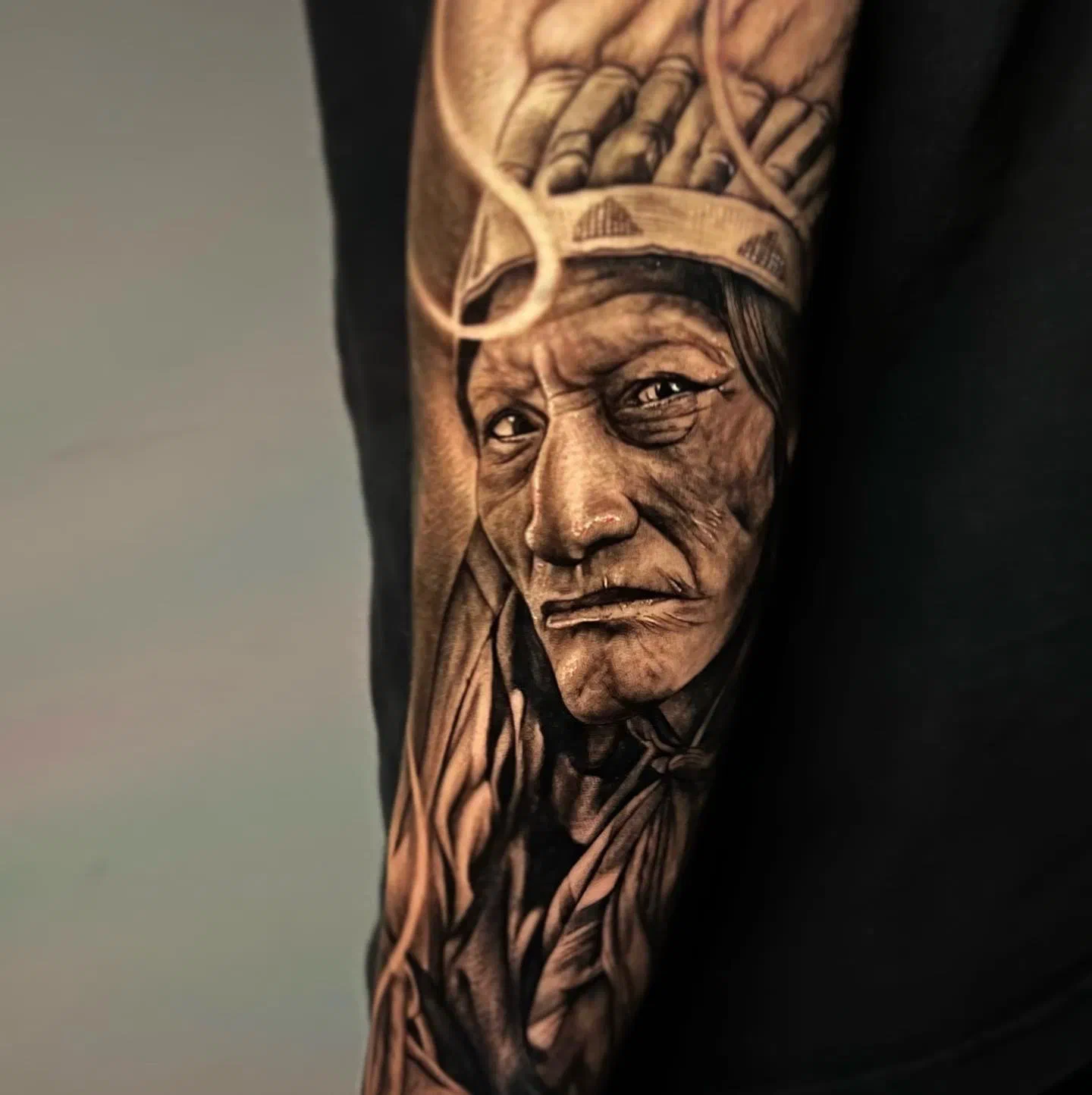 black and gray indigenous people portrait realism tattoo los angeles