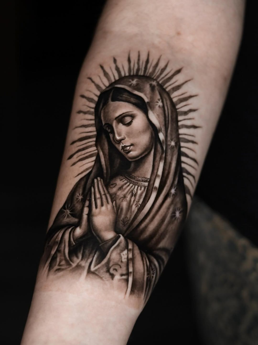 Religious Virgin Mary Tattoo On Forearm In Black And Gray
