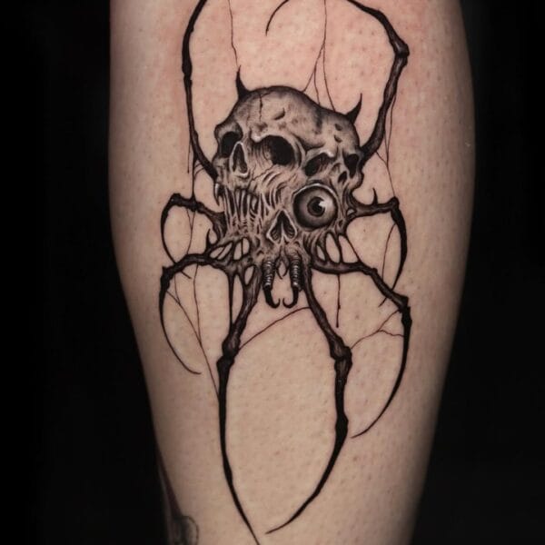 Creepy Abstract Spider And Skulls Tattoo On Leg