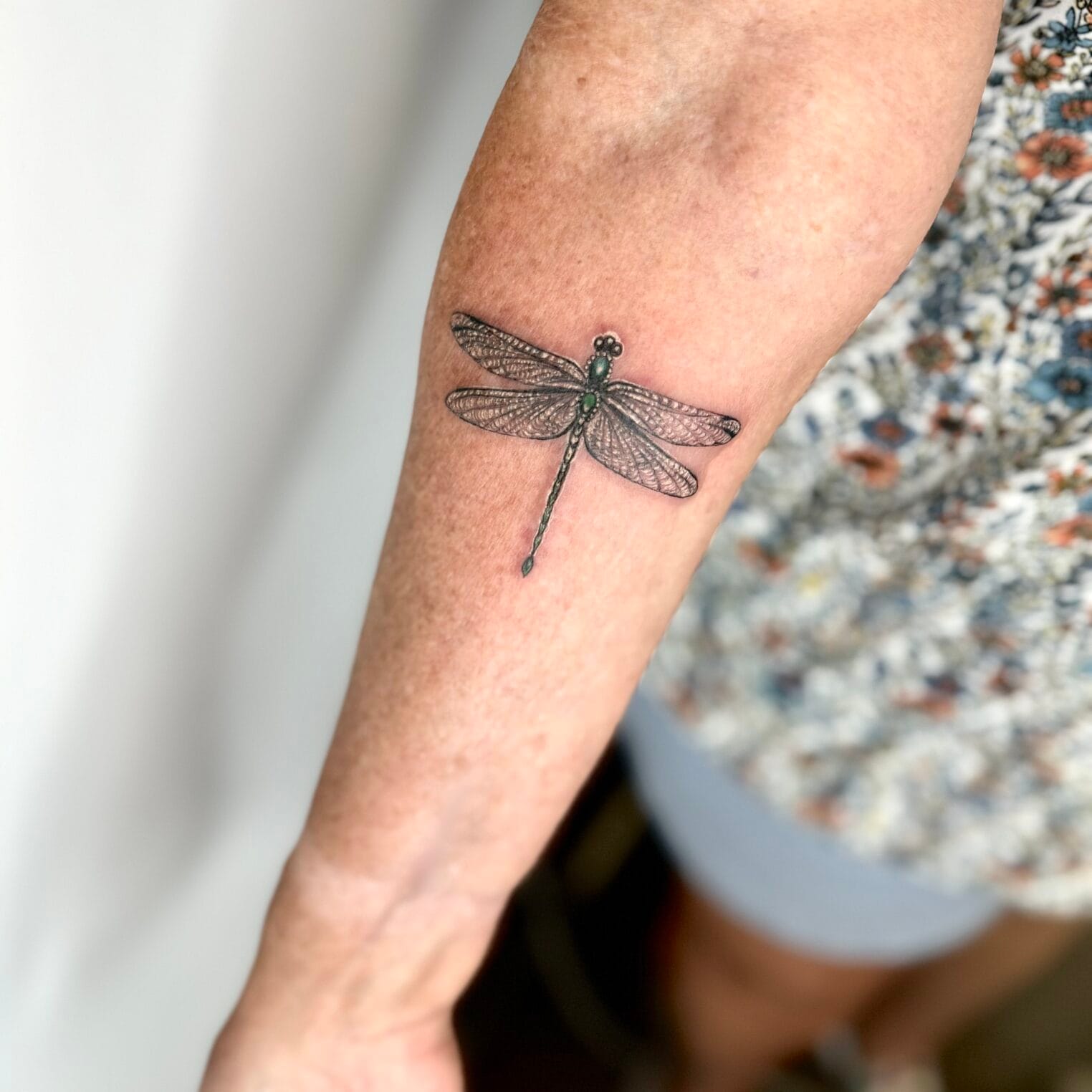 Gentle Dragonfly Tattoo On Arm