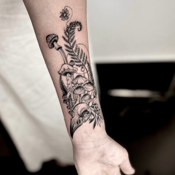Witchy Forearm Tattoo With Bird Skull And Mushrooms