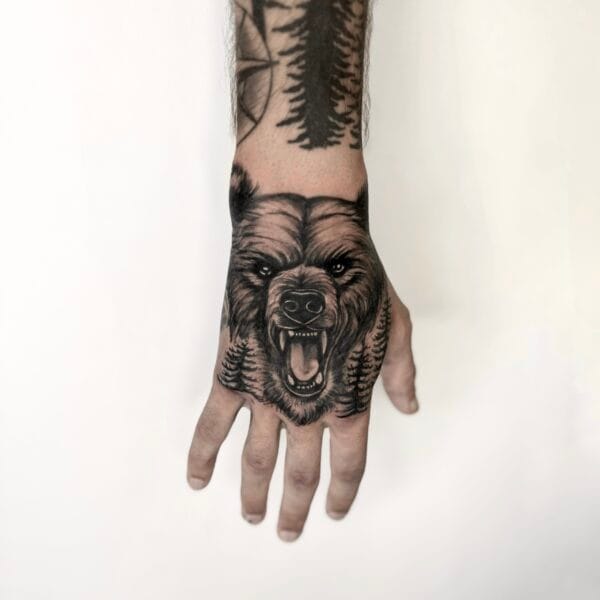 Bear Tattoo On Hand In Black And Gray