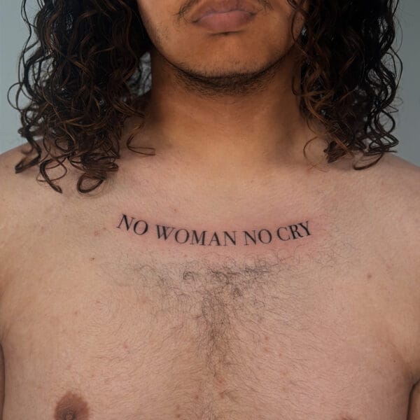 No Woman No Cry Chest Lettering Tattoo