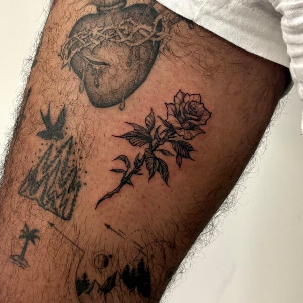 Small Fine Line Rose Upper Leg Tattoo