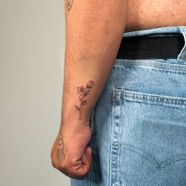 Small Fine Line Flower Forearm Tattoo