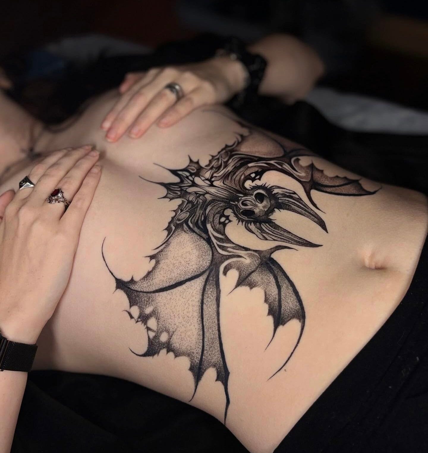 Dotwork Bat Stomach Tattoo In Black Ink