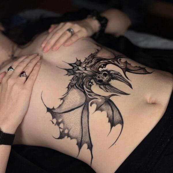 Dotwork Bat Stomach Tattoo In Black Ink