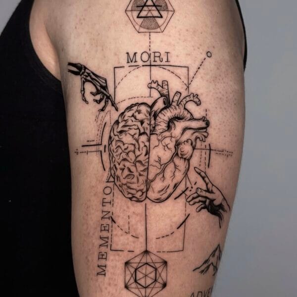Collage-Style Heart And Brain Upper Arm Tattoo With Fine Lines And Details