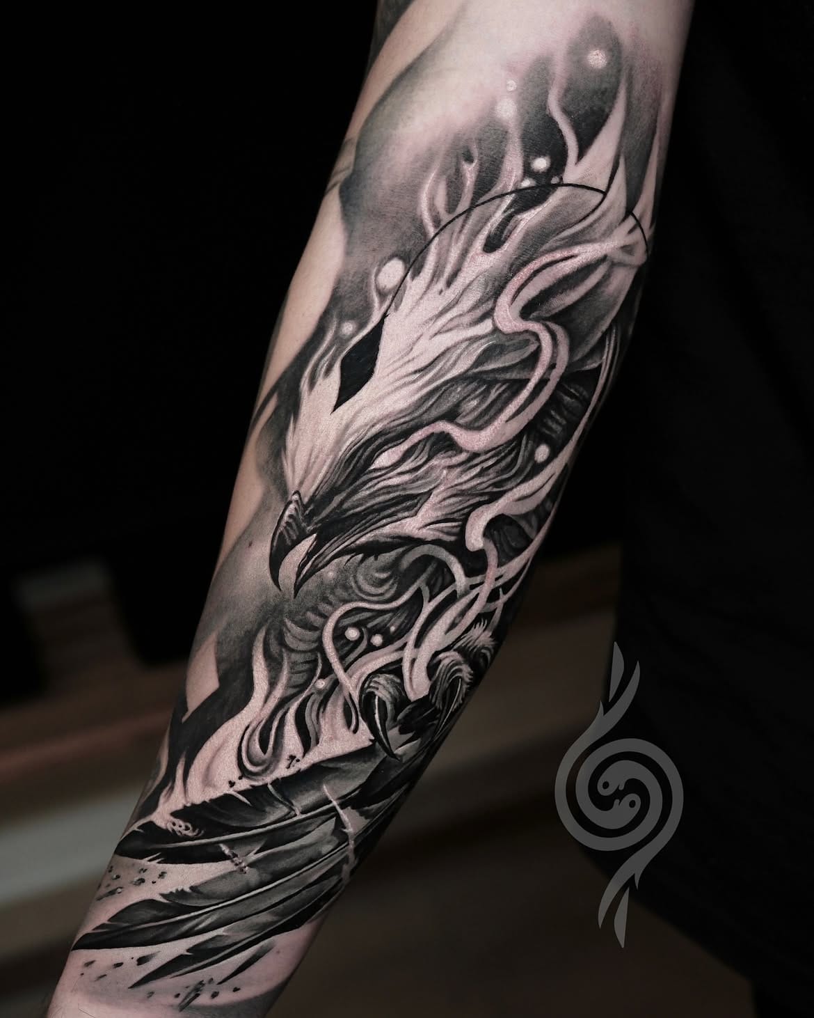 Realistic Bird And Feather Forearm Tattoo In Black And Gray