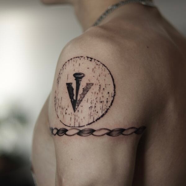 Symbolic Black And Gray Shoulder Tattoo