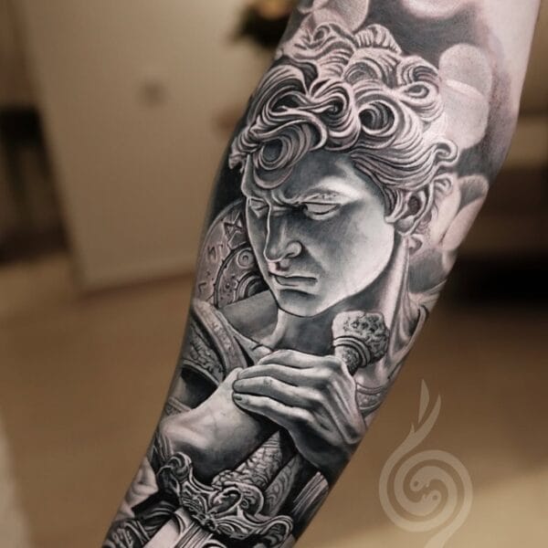 Greek Mythology Realism Forearm Tattoo With Sword