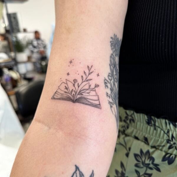 Delicate Book And Leaves Fine Line Tattoo