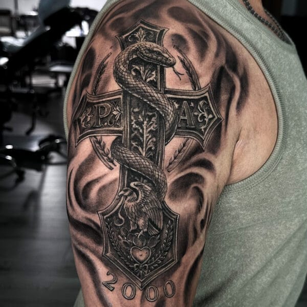 Black And Gray Cross And Snake Shoulder Tattoo