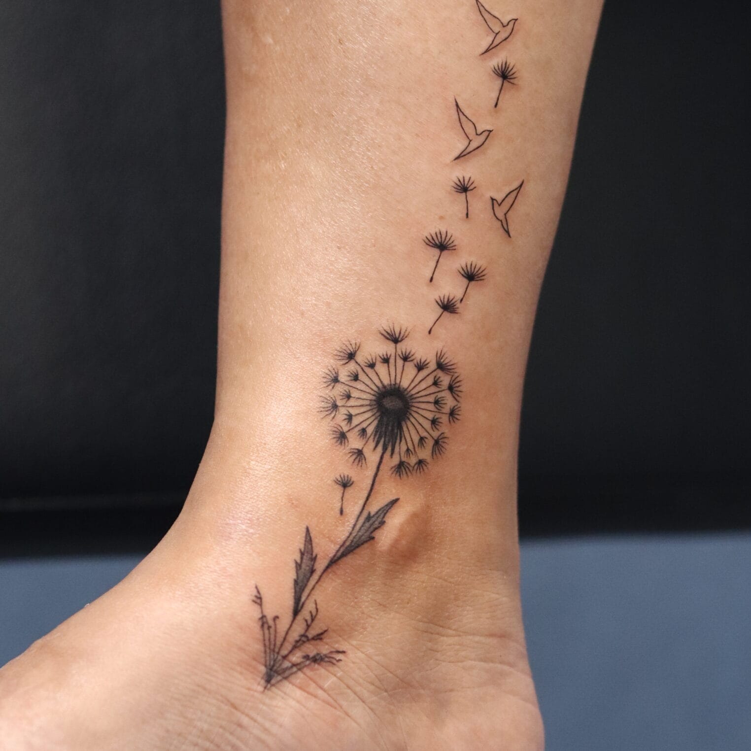 Fine Line Dandelion Tattoo On The Ankle